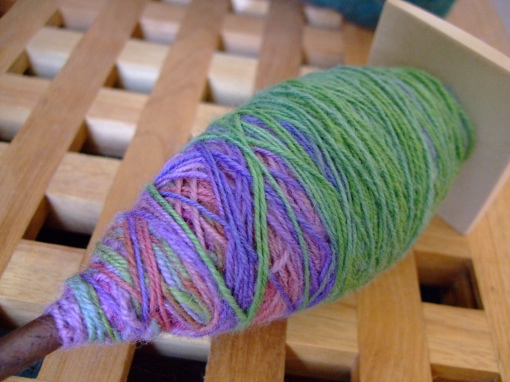 50 grams of chain-plied yarn on Spindlewood Mini